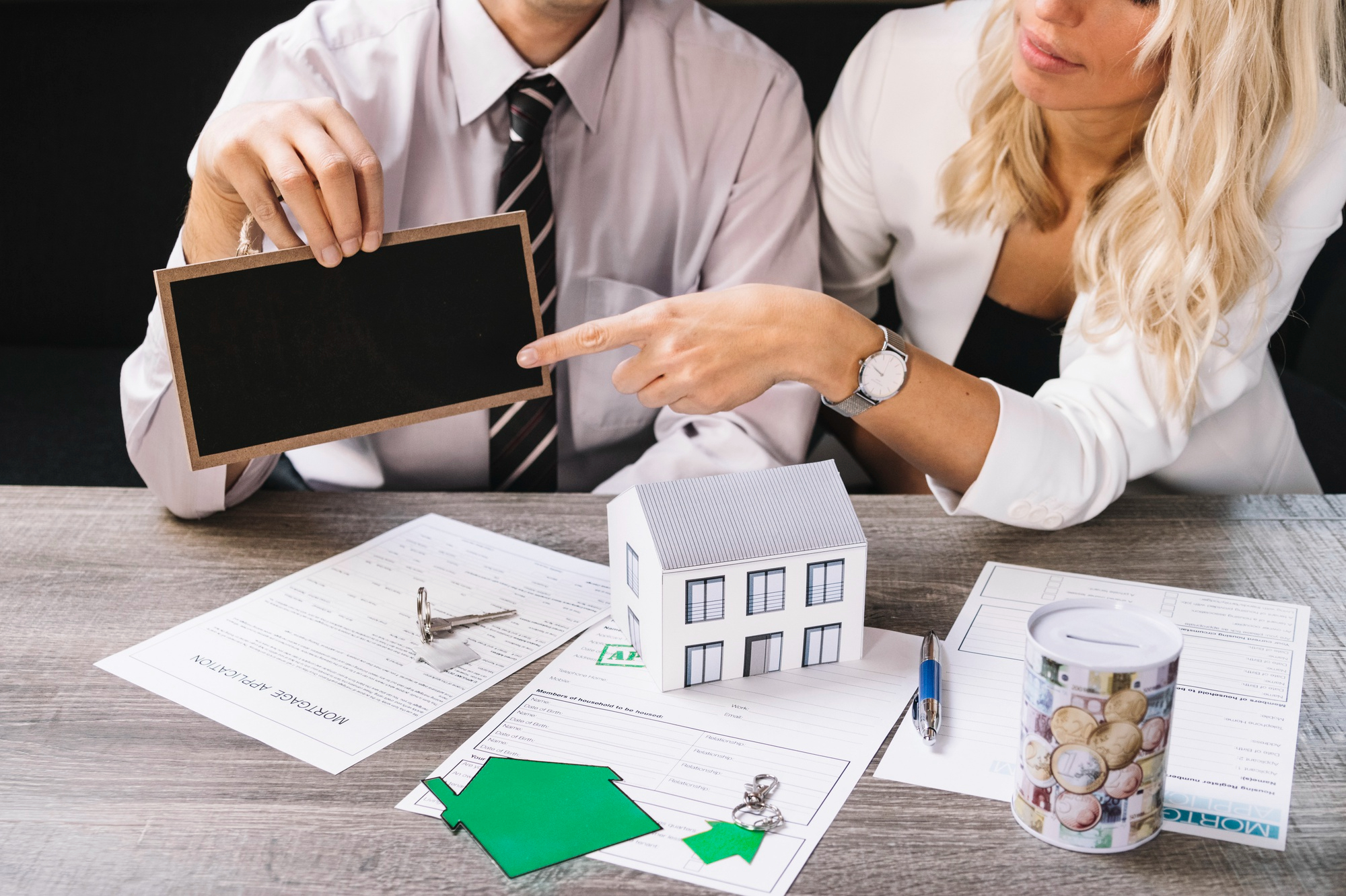 Couple discussing property mortgage application